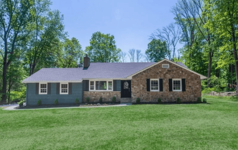 Brick ranch with windows by Pexic Windows