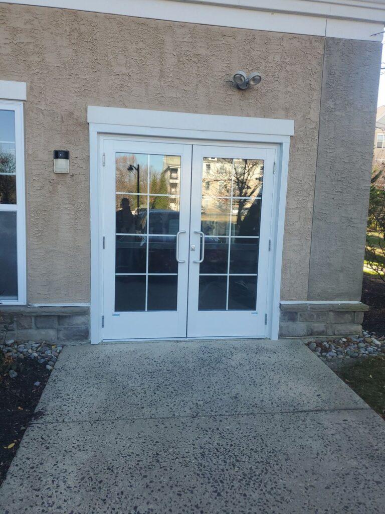 White French entry doors on a commercial building
