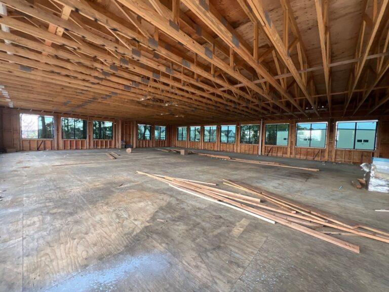 Row of commercial windows installed in a framed office space