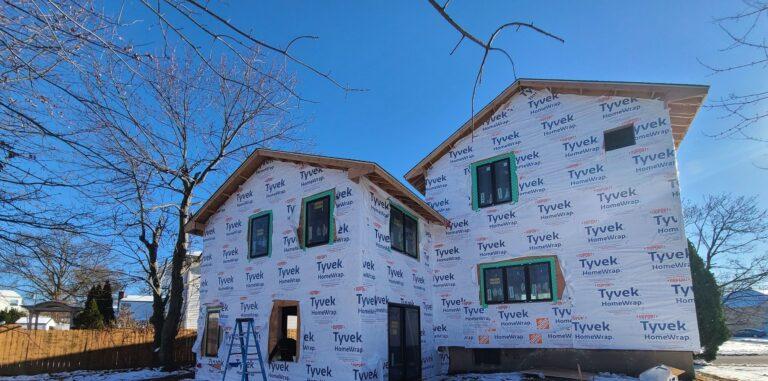 Home addition with black windows installed by Pexic Windows