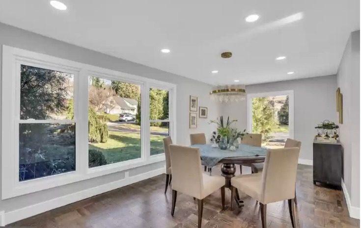 Dining room with large double-hung windows by Pexic Windows