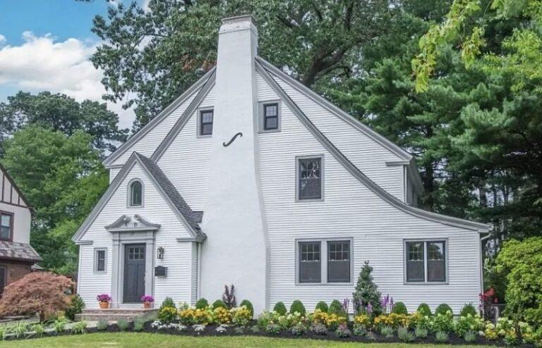 White clapboard home with new windows by Pexic Windows